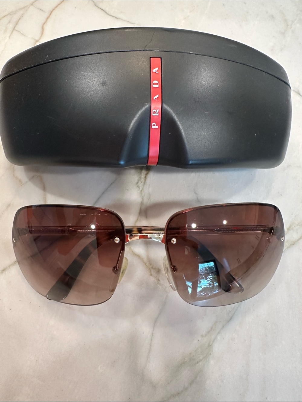PRADA rimless shield sunglasses